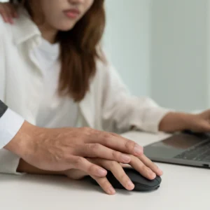 Harassment awareness training scenario showing employee discomfort at workplace