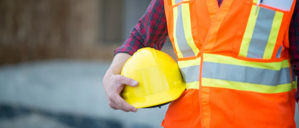 Team members following safety procedures to build a strong workplace safety culture.