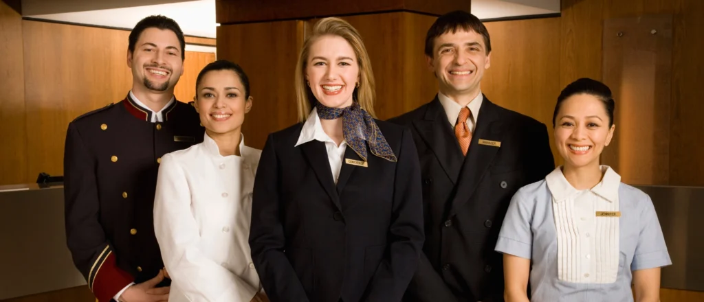 Hospitality workers receiving health and safety training in a hotel, restaurant, bar, or event venue environment.