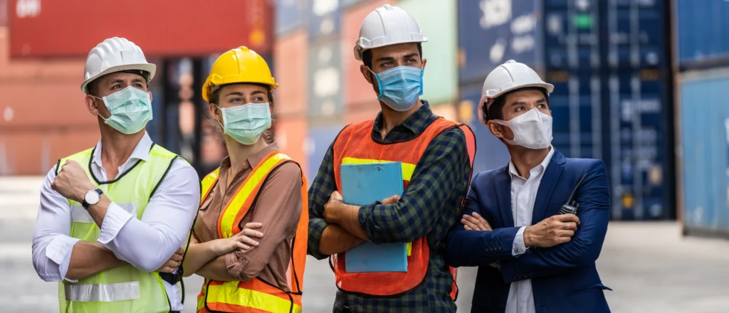 Joint Health and Safety Committee (JHSC) meeting with workers and management collaborating to improve workplace safety and comply with Ontario’s Occupational Health and Safety Act.