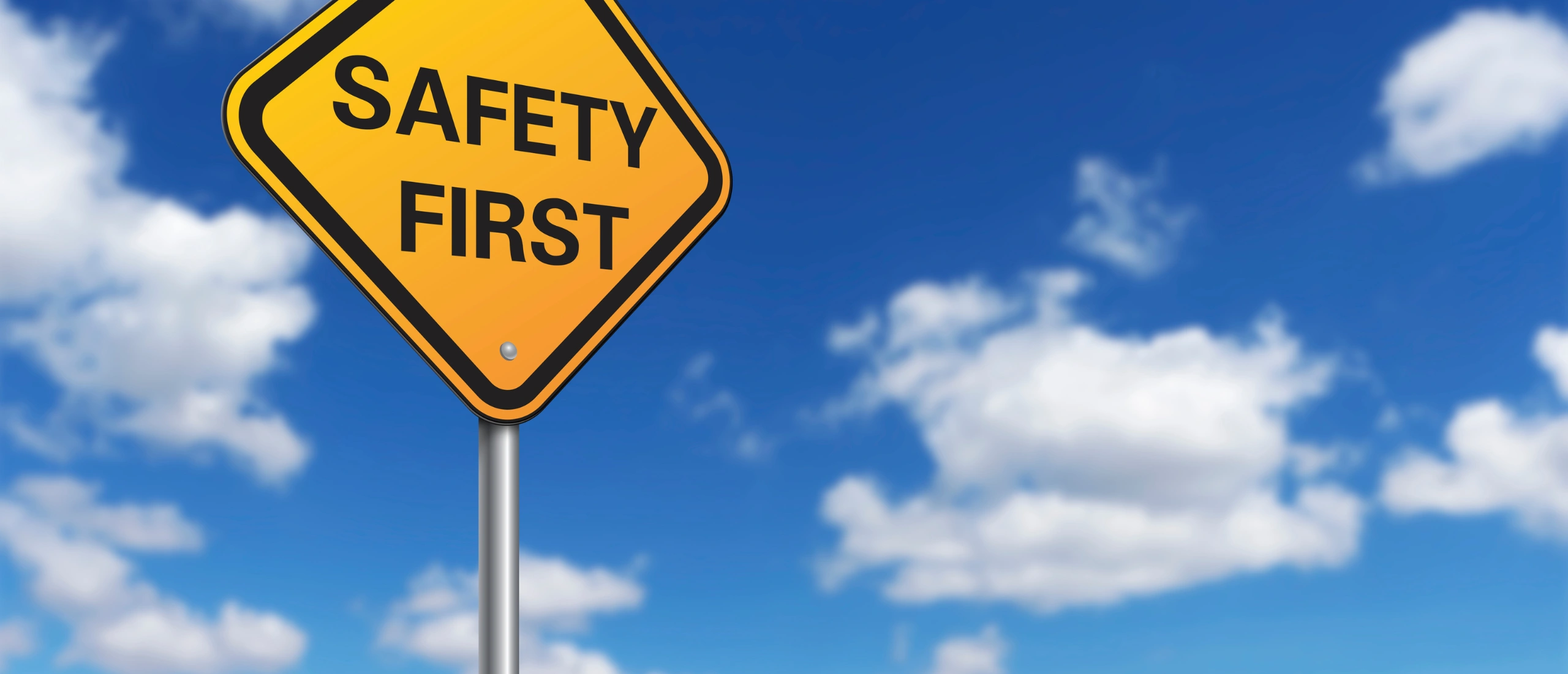 Workplace safety image showing risks of reversing vehicles and the importance of signallers and traffic control plans in industrial facilities.